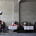 A man sanitises a quarantine facility for refugees..jpg
